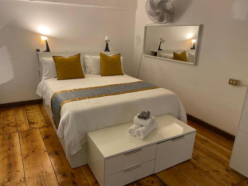 Posteľ alebo postele v izbe v ubytovaní Coronari 45 apartment