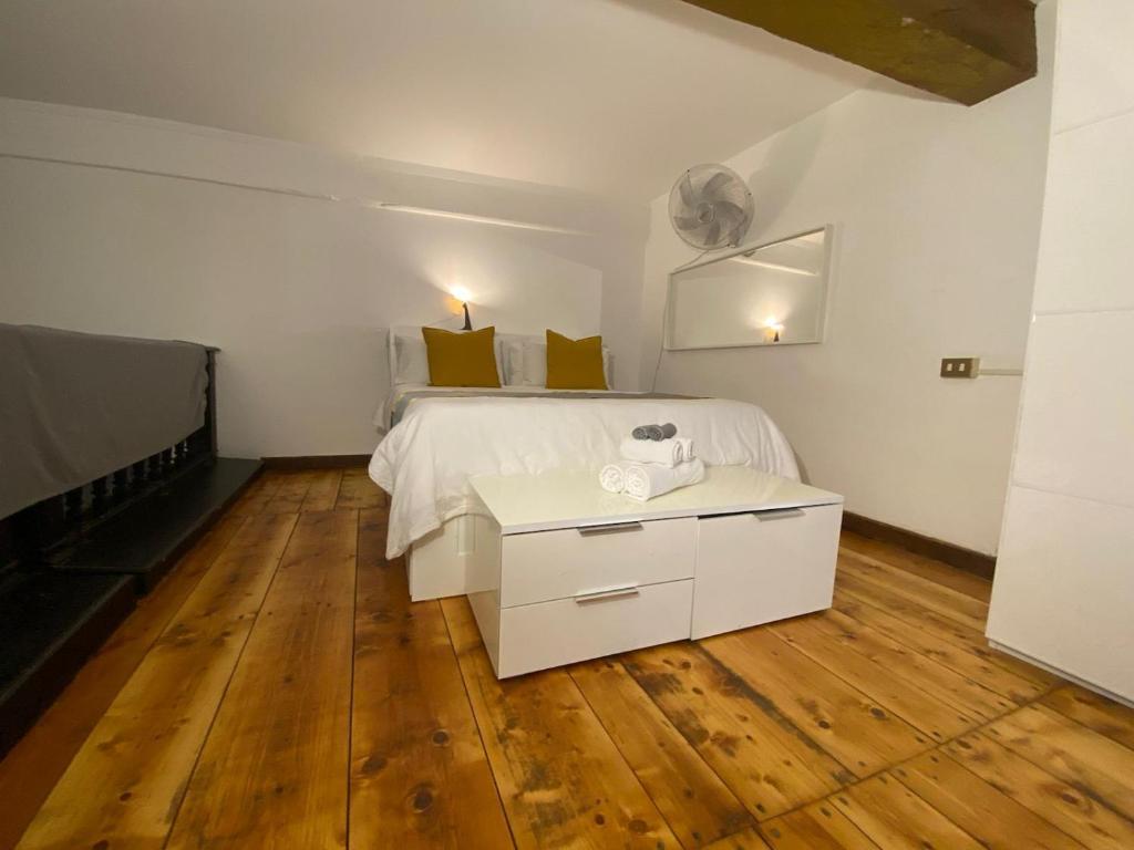 Posteľ alebo postele v izbe v ubytovaní Coronari 45 apartment