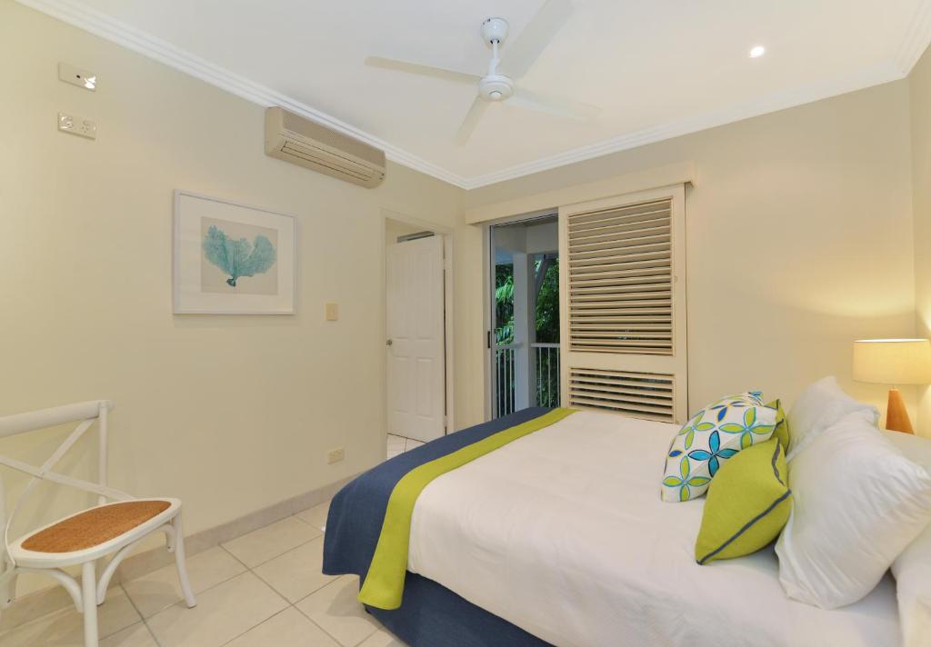 Postel nebo postele na pokoji v ubytování Reef Villa Port Douglas
