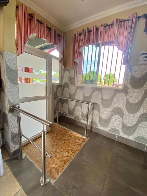 Postel nebo postele na pokoji v ubytování Hotel Residencial Panamericano