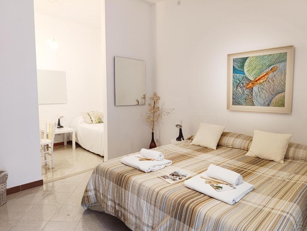 Postel nebo postele na pokoji v ubytování Ficodindia Rooms