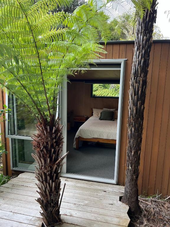 Postel nebo postele na pokoji v ubytování Punga Cabin