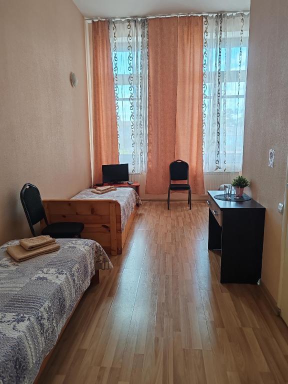 Postel nebo postele na pokoji v ubytování Hotel Ludza