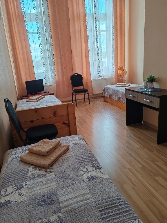 Postel nebo postele na pokoji v ubytování Hotel Ludza