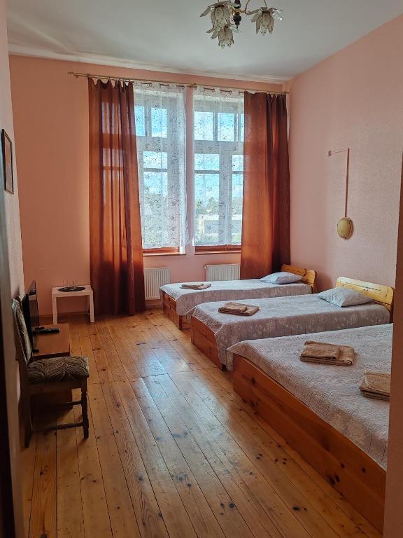 Postel nebo postele na pokoji v ubytování Hotel Ludza