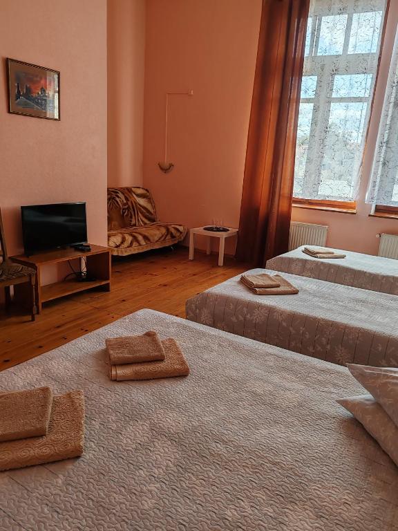Postel nebo postele na pokoji v ubytování Hotel Ludza