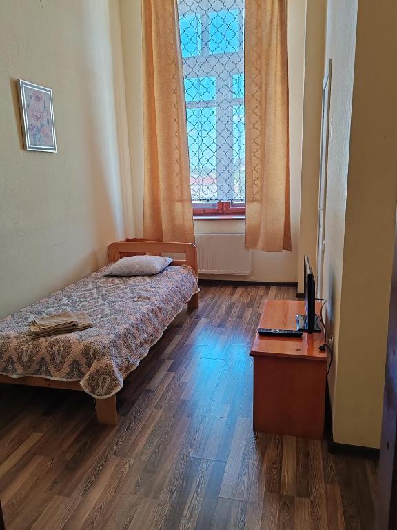 Postel nebo postele na pokoji v ubytování Hotel Ludza