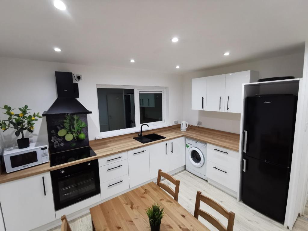 Kuchyň nebo kuchyňský kout v ubytování Lemon Apartment