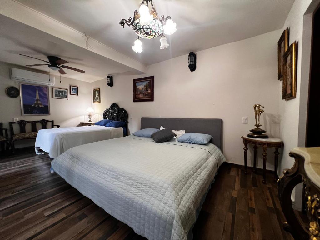 Postel nebo postele na pokoji v ubytování Hotel River Blue