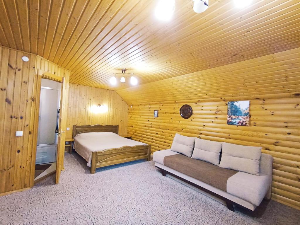 Postel nebo postele na pokoji v ubytování Садиба Чорногора