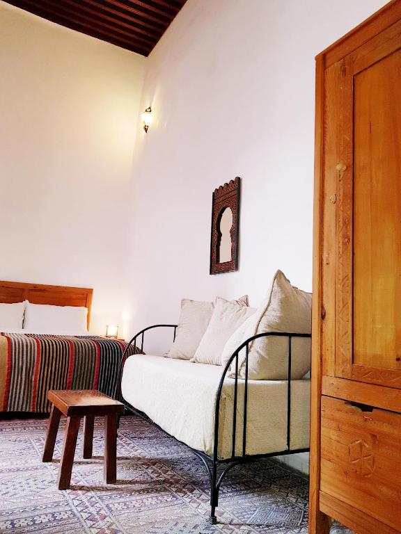 Postel nebo postele na pokoji v ubytování Riad Inspira