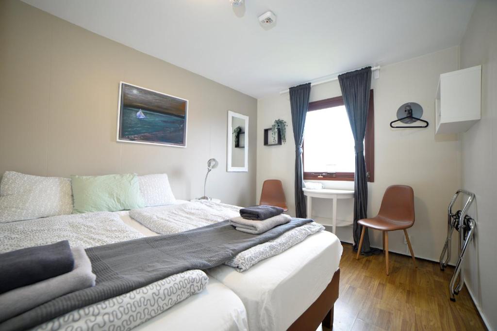 Rúm í herbergi á Klausturhof Guesthouse