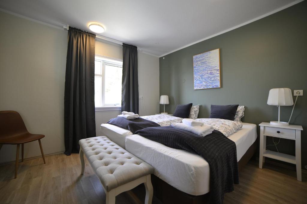 Rúm í herbergi á Klausturhof Guesthouse