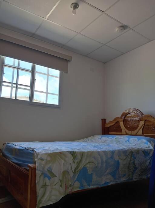 Postel nebo postele na pokoji v ubytování Casa David Boquete Csar