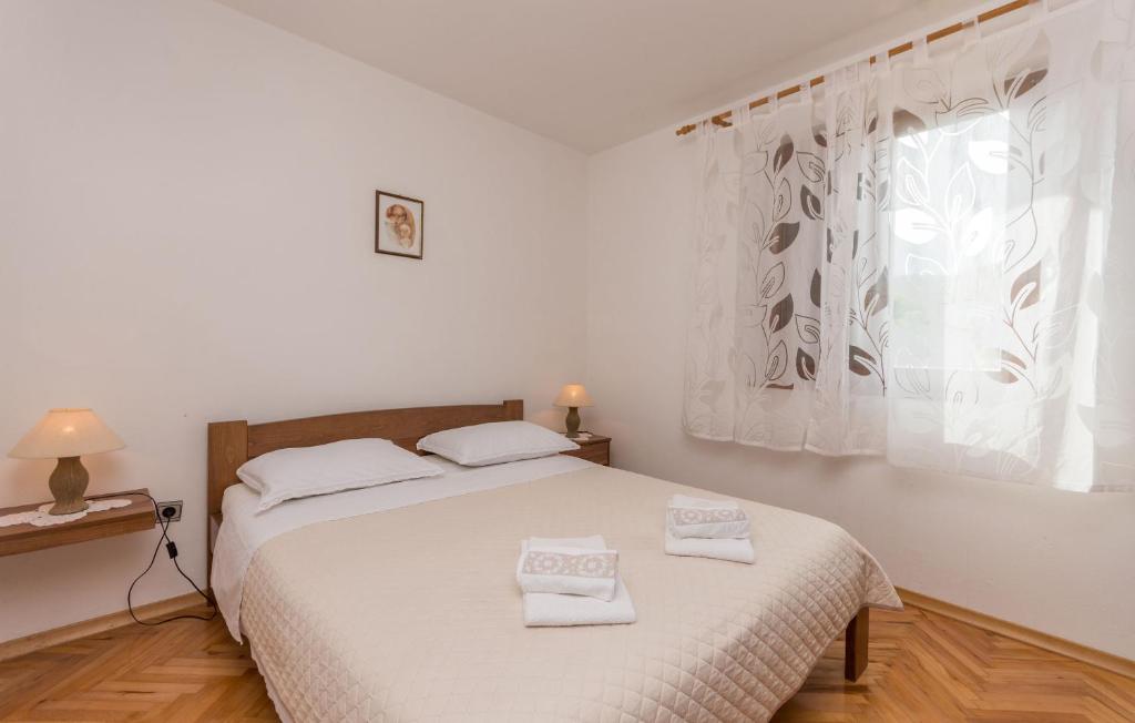 Posteľ alebo postele v izbe v ubytovaní Apartment Blazenka