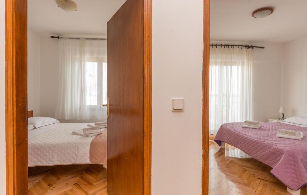Posteľ alebo postele v izbe v ubytovaní Apartment Blazenka