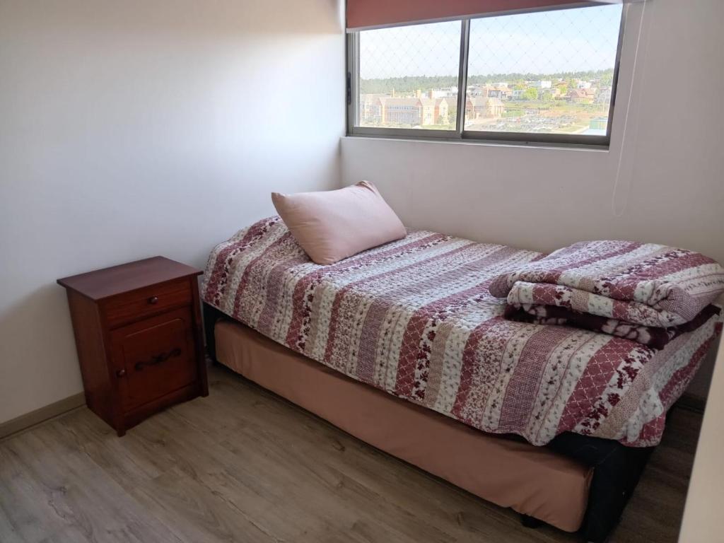Postel nebo postele na pokoji v ubytování Lindo y acogedor departamento.