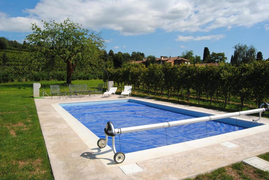 Bazén v ubytovaní Agriturismo Giorgio Colutta alebo v jeho blízkosti