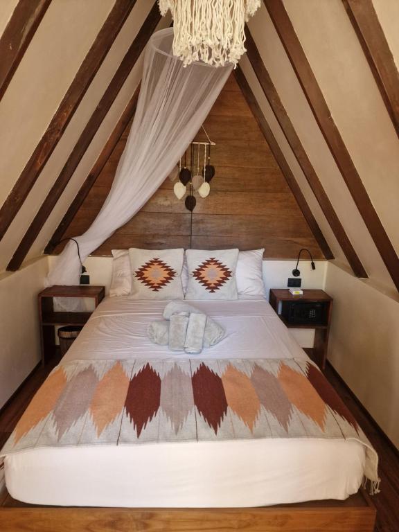 Postel nebo postele na pokoji v ubytování Luna y Sol Glamping Holbox