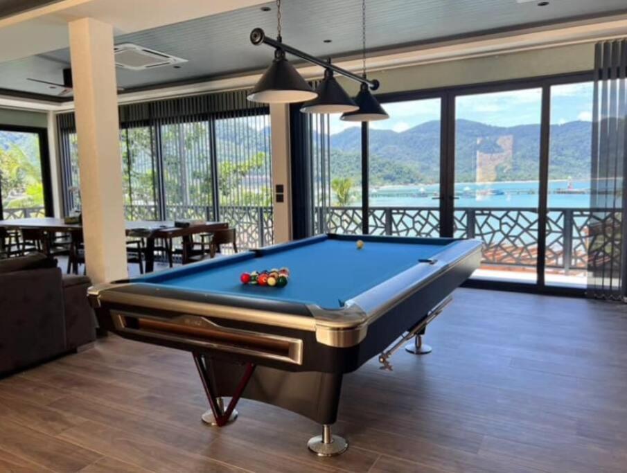 a pool table in a room with a view at Villa Tranquility - Ultimate Estate in Ban Bang Bao