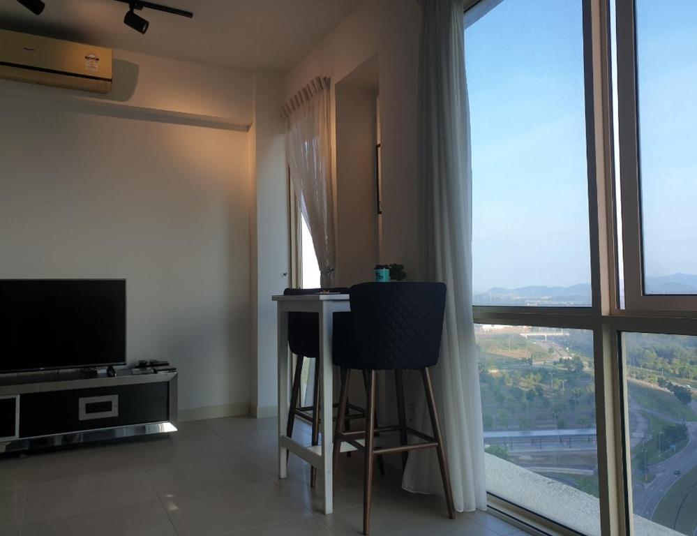 TV a/nebo společenská místnost v ubytování Cosy Afiniti suite next to Legoland