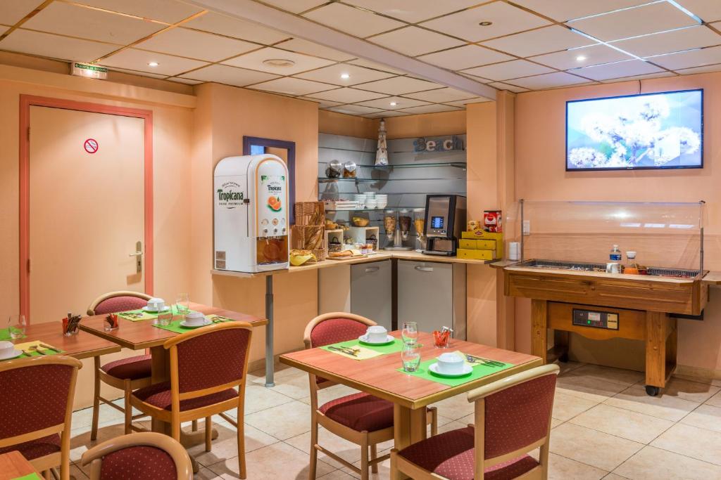 Kuchyň nebo kuchyňský kout v ubytování Hotel Provencal