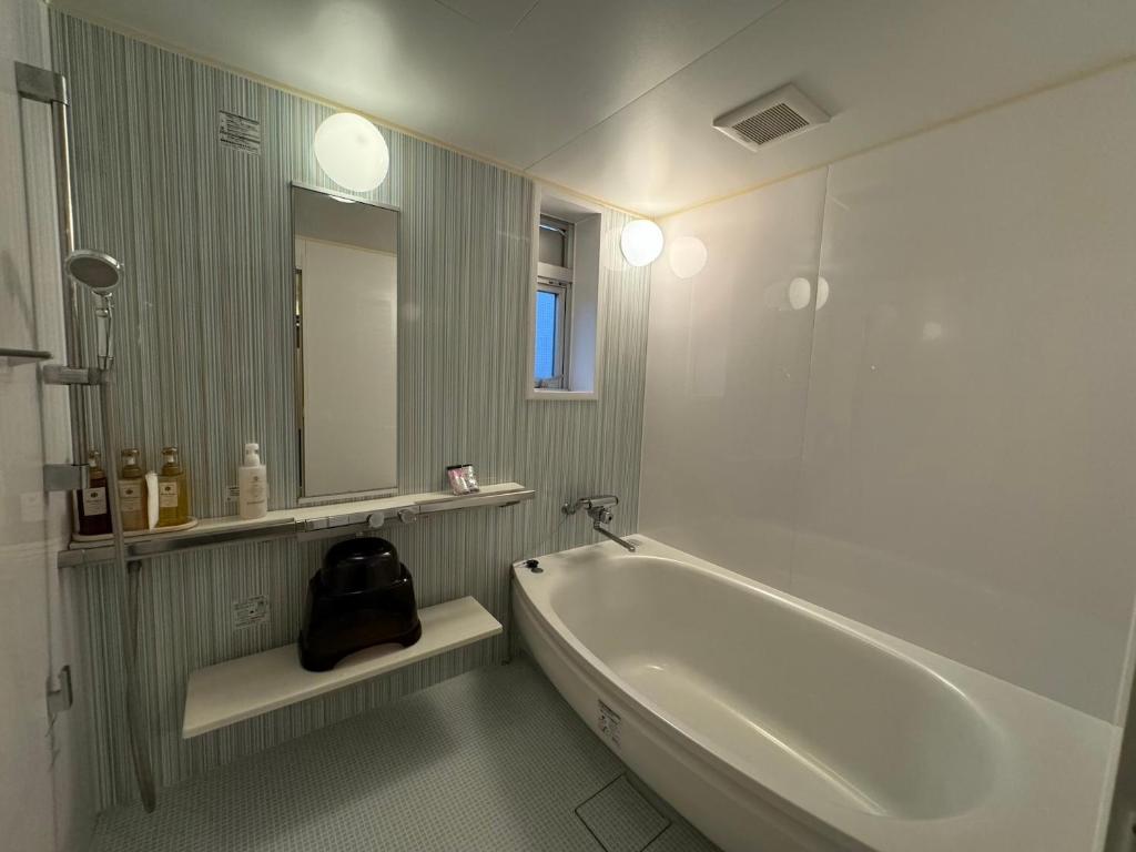 Koupelna v ubytování Hotel RIO新宿