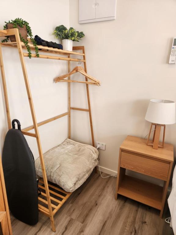 Postel nebo postele na pokoji v ubytování Kawatiri Palms