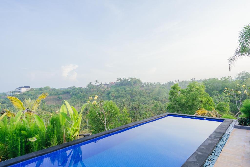 Bazén v ubytování Kelingking Paradise Suites Villa nebo v jeho okolí