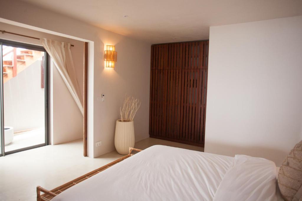 Postel nebo postele na pokoji v ubytování Chantauvent Guest House