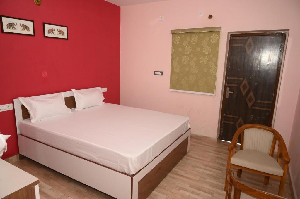 Postel nebo postele na pokoji v ubytování shangrila stay