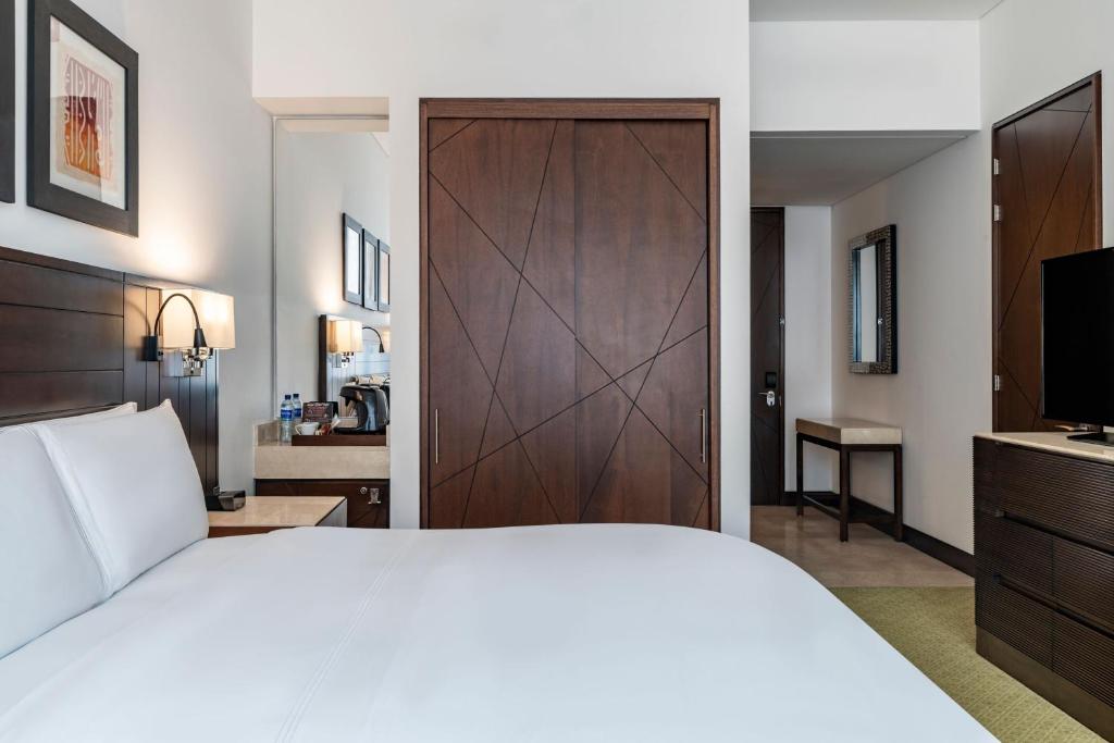 Postel nebo postele na pokoji v ubytování Bogotá Marriott Hotel