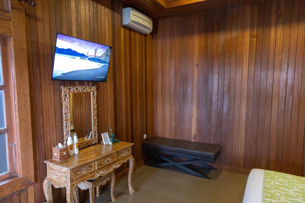 TV a/nebo společenská místnost v ubytování Tattva Ubud Retreat & Wellness