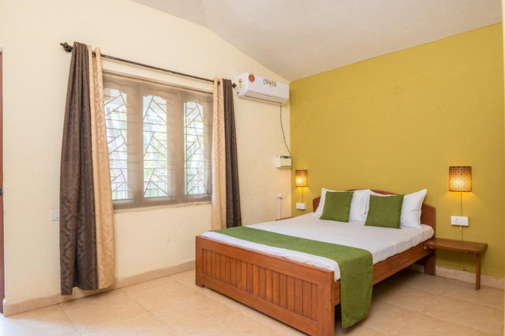 Postel nebo postele na pokoji v ubytování Casa Euphoria Apartments