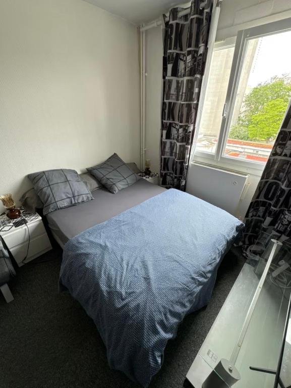 Postel nebo postele na pokoji v ubytování Chambre privée avec Clé