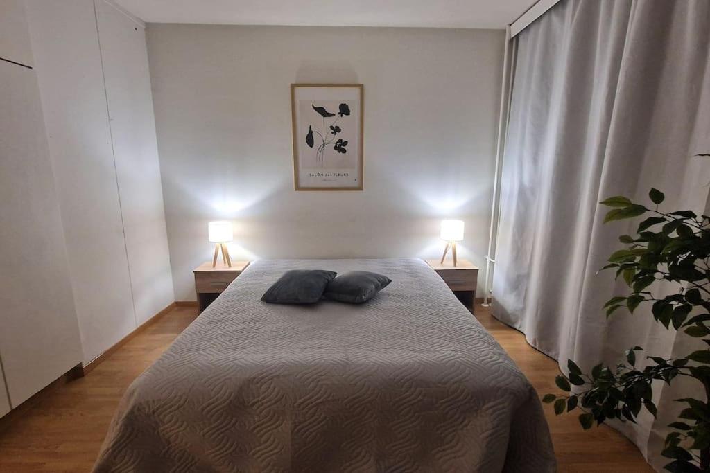 Postel nebo postele na pokoji v ubytování Villa Ruths Stay Salmi