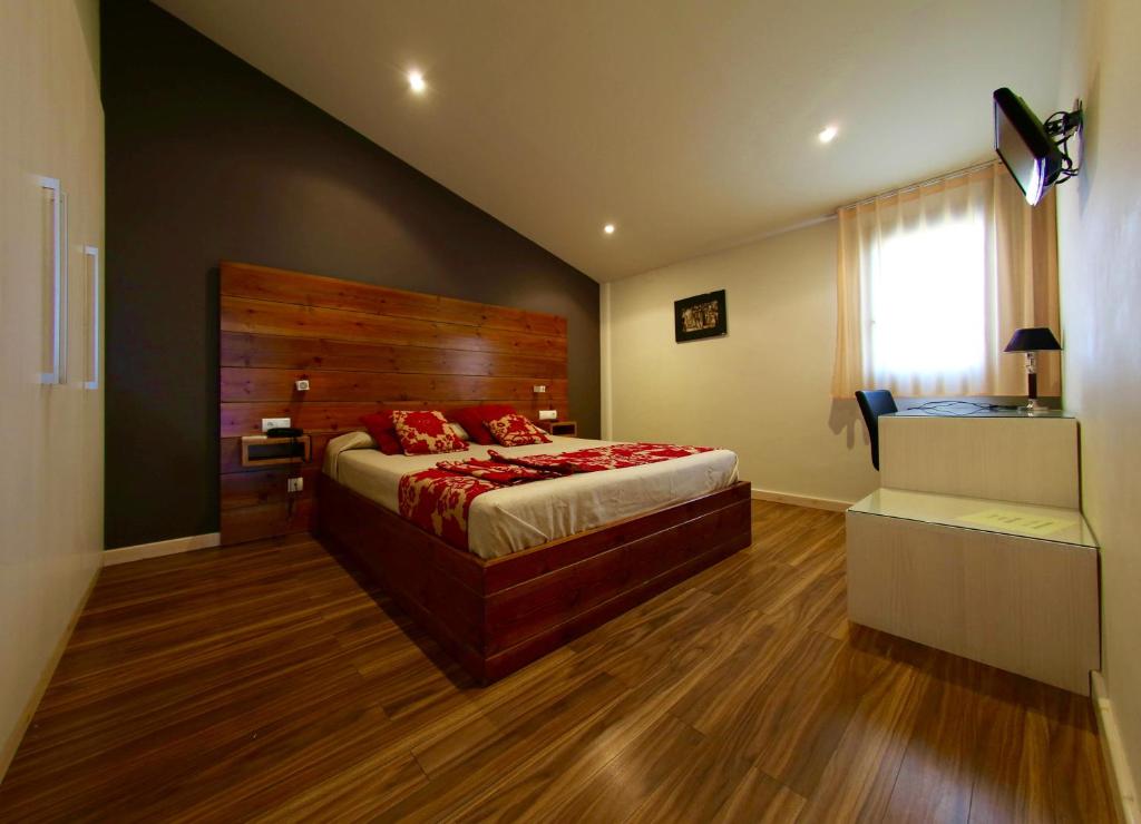 Posteľ alebo postele v izbe v ubytovaní Hotel Mas Prades