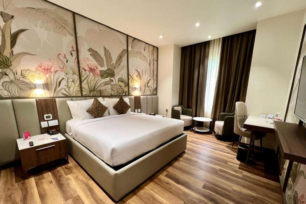 Postel nebo postele na pokoji v ubytování Ramada Resort by Wyndham Kochi