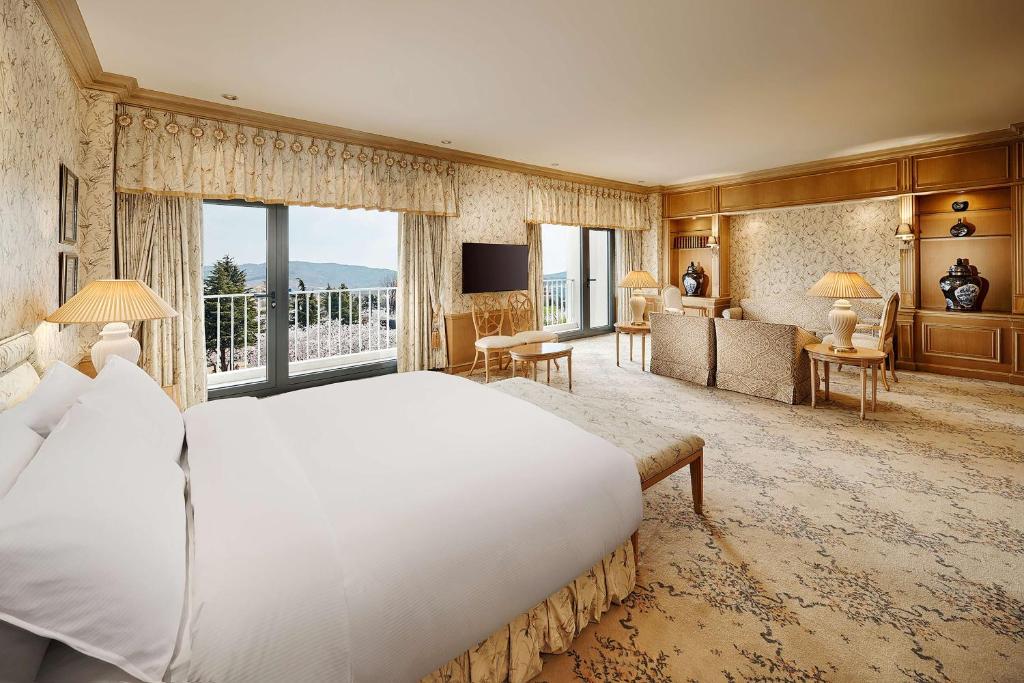 Postel nebo postele na pokoji v ubytování Hilton Gyeongju