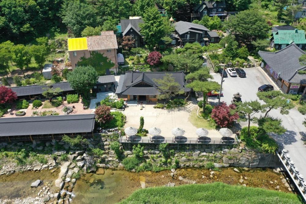 a model of a house with a garden at Saint in Udumji Pool Villa in Sanjeong-ri