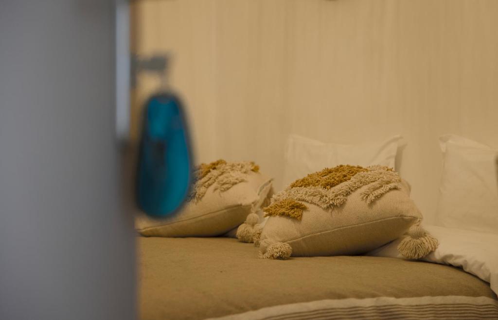 Postel nebo postele na pokoji v ubytování Hotel Riad Amlal