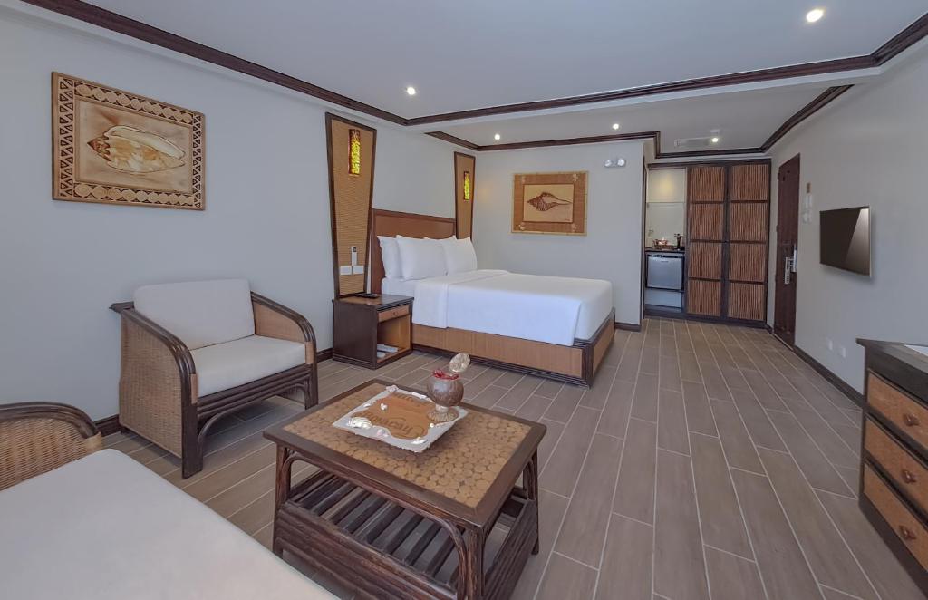 Postel nebo postele na pokoji v ubytování Red Coconut Beach Hotel Boracay