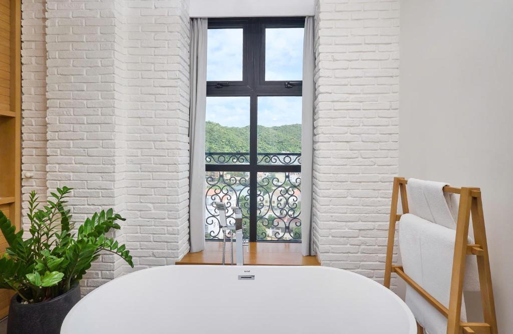 Giường trong phòng chung tại Skool Plus Vung Tau