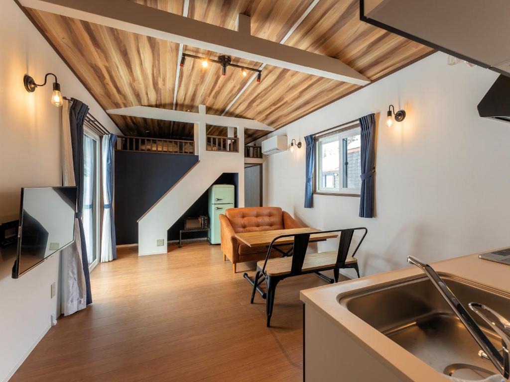 TV a/nebo společenská místnost v ubytování Myoko Onsen cottage Ajisai