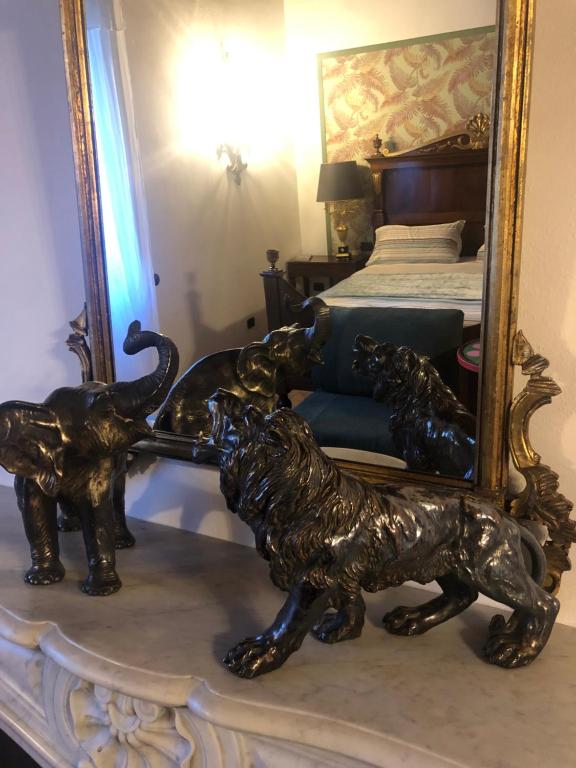 Postel nebo postele na pokoji v ubytování B&B Villa la Canonica con piscina privata a Padernello