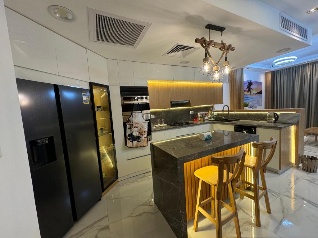 Kuchyň nebo kuchyňský kout v ubytování Luxury Smart Home- Villa Duplex