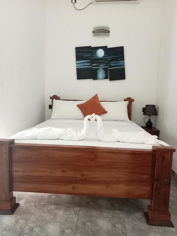 Postel nebo postele na pokoji v ubytování Oviniru Beach Hotel