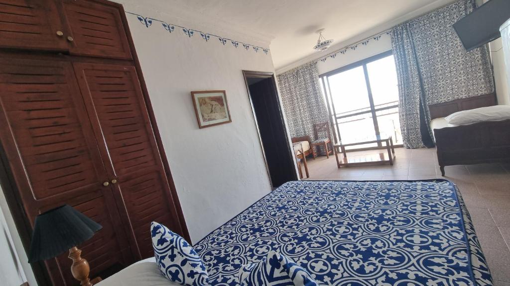 Postel nebo postele na pokoji v ubytování Hotel Zelis
