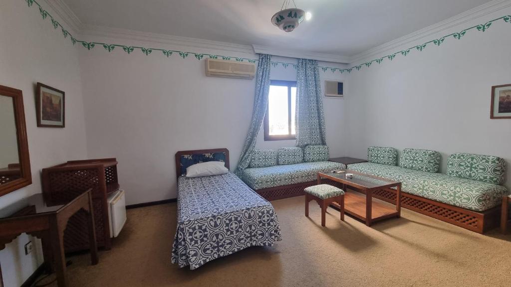 Postel nebo postele na pokoji v ubytování Hotel Zelis