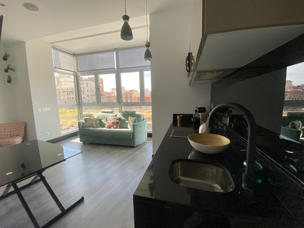 Kuchyňa alebo kuchynka v ubytovaní Stay U-nique Apartments Rosaleda